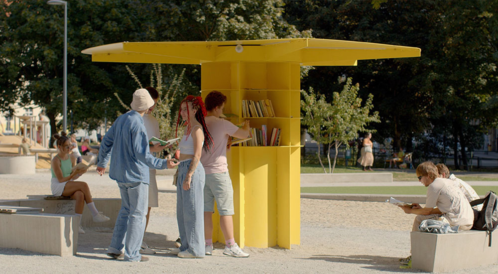 Teenagers accessing outdoor library